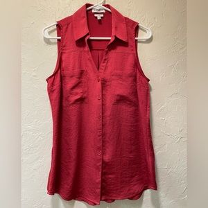 Satin sleeveless button up.